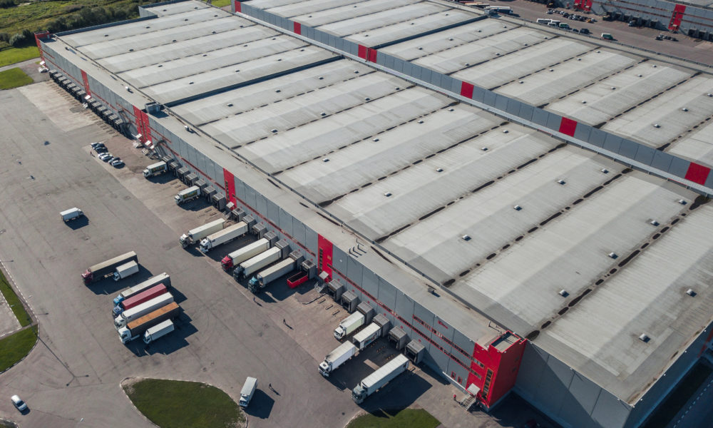 Aerial view of trucks loading at logistic center