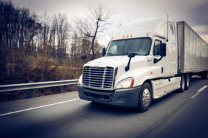 Semi truck 18 wheeler on highway - CRA Cargo Theft Blog